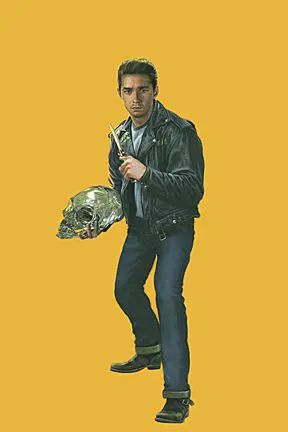 A man holding a skull in his hand.